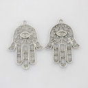 Pakabukas Hamsa ranka sidabro spalvos 33x23mm